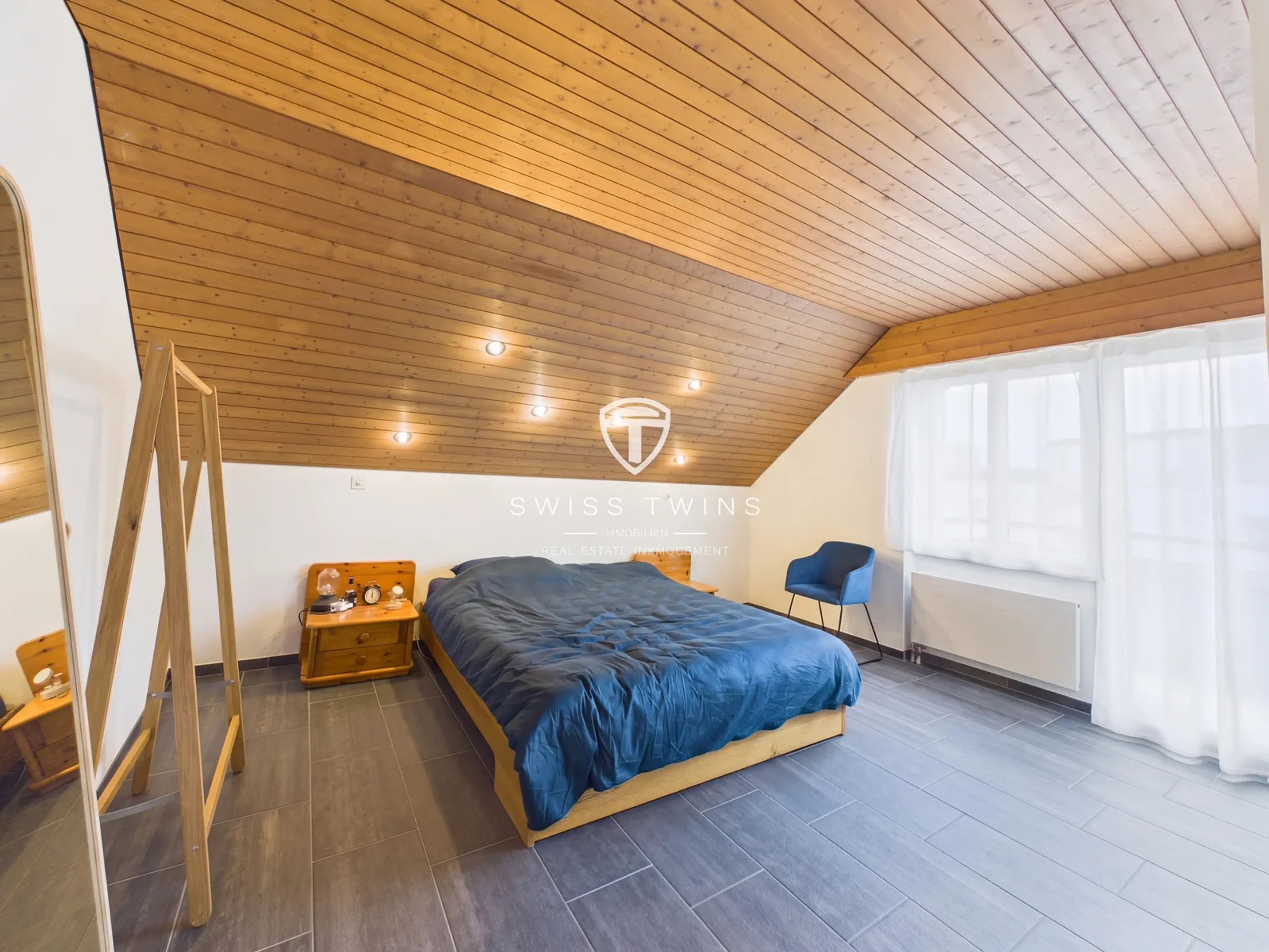 Grosszügige 4.5-Zimmer-Dachwohnung mit Cheminée und zwei Balkonen in Effretikon - 4