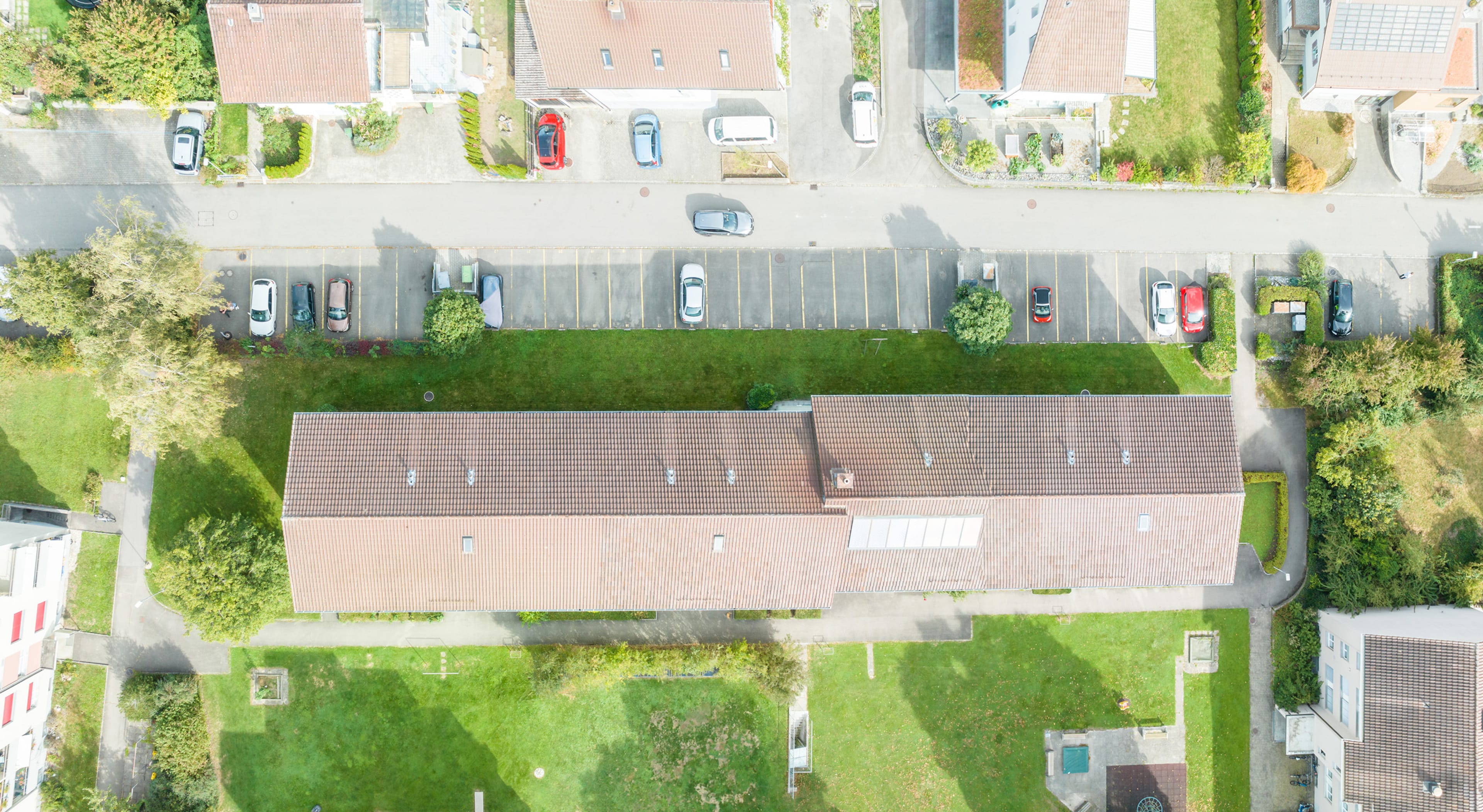 Anlageobjekt: Vier Mehrfamilienhäuser mit 24 Wohnungen und 28 Aussenparkplätzen - Bild 3