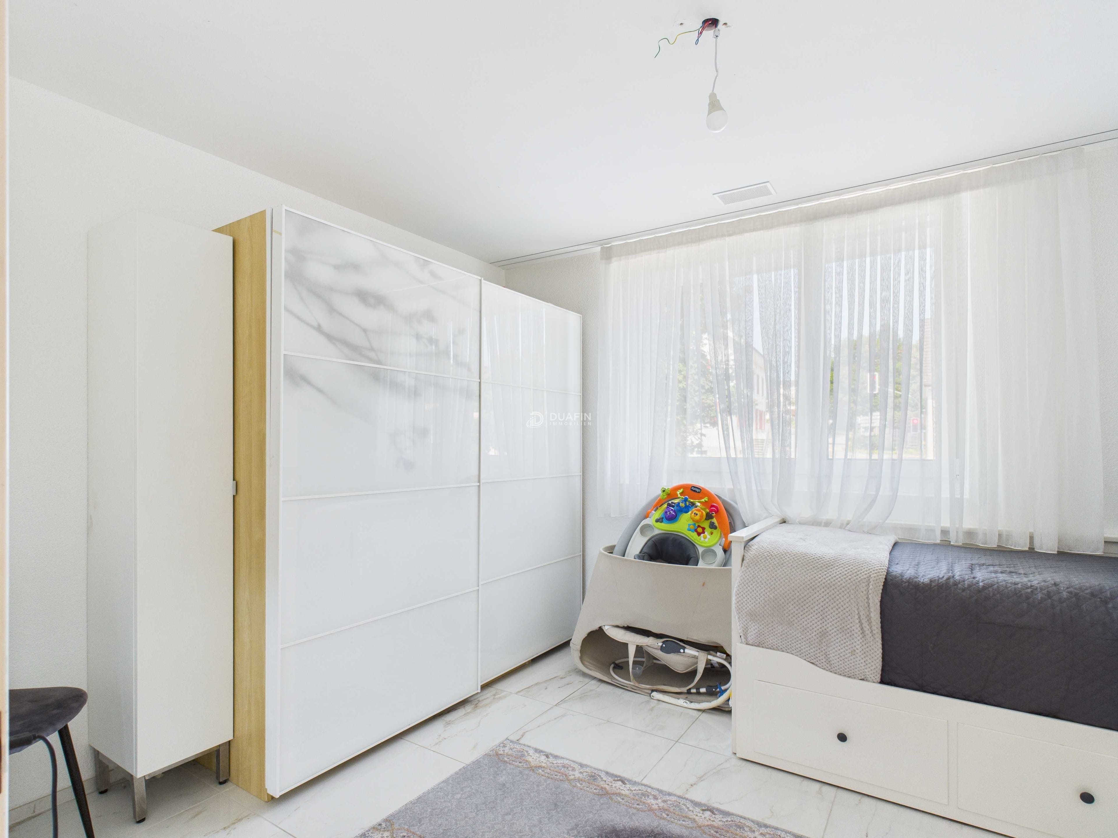 Moderne 4.5-Zi.-Wohnung mit Balkon & 2 TG in Ottenbach kaufen - Bild 5