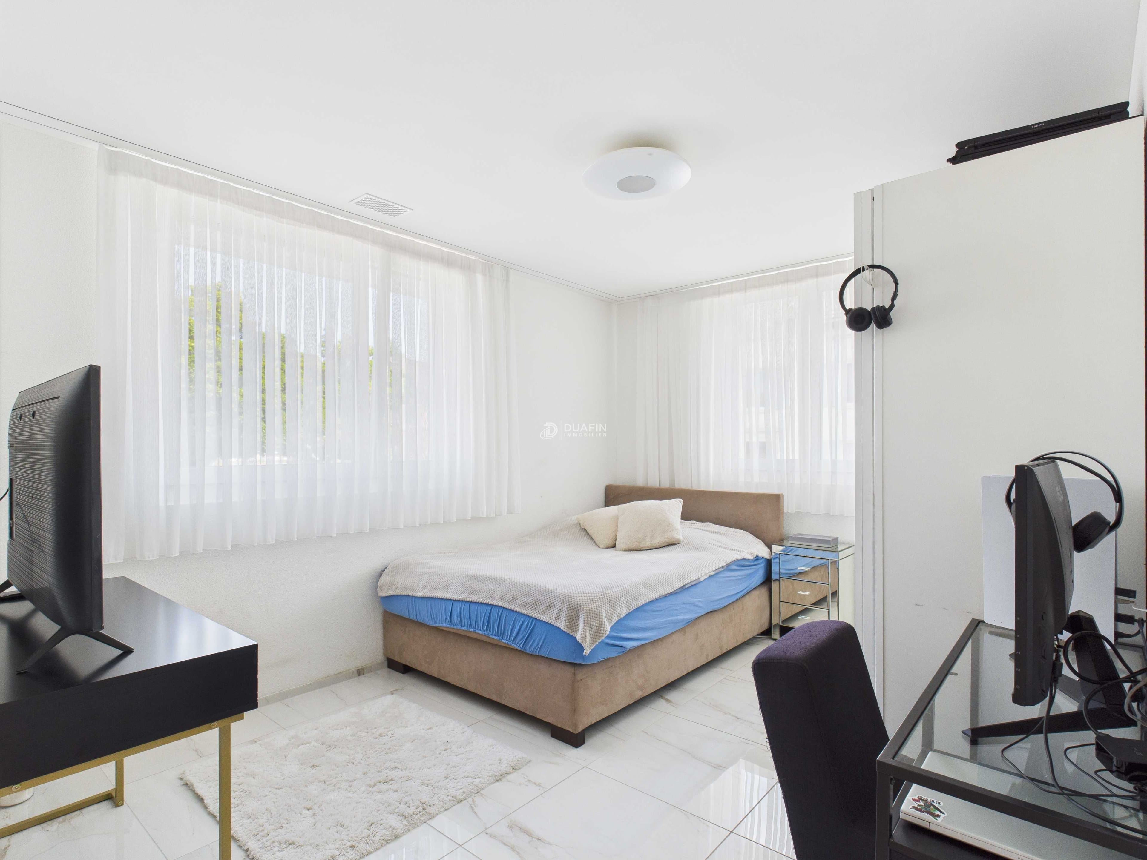 Moderne 4.5-Zi.-Wohnung mit Balkon & 2 TG in Ottenbach kaufen - Bild 4