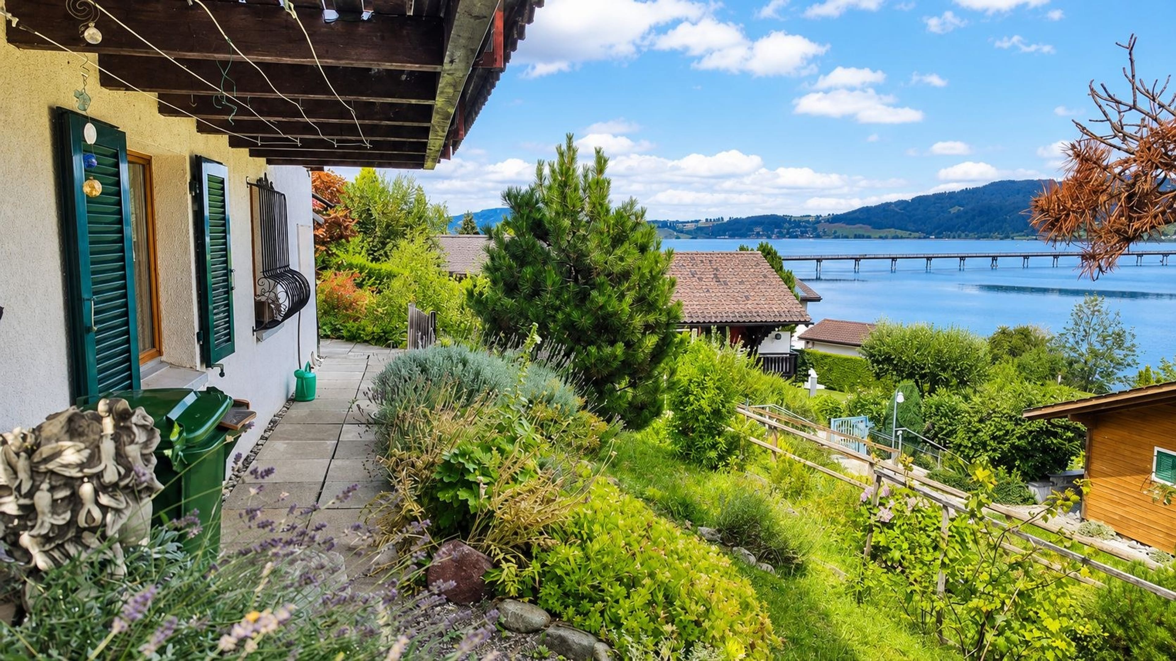 FERIENHAUS MIT SENSATIONELLER SEE- UND BERGSICHT - 4